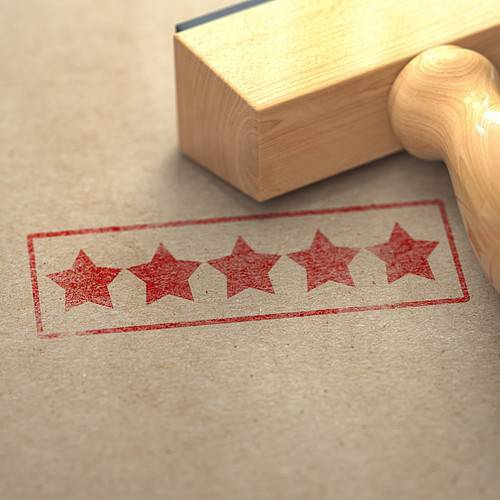 Five stars printed on craft paper with stamp.